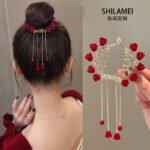 Red garland tassel ball clip